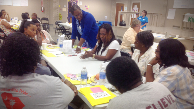 Women from all backgrounds – educators, judges, lawyers, advocates, activists, social workers, students and struggling moms – from towns in the Mississippi Delta meet at a community center in Indianola, MS, to discuss their most pressing needs. In this breakout session, they explored policy solutions that could meet those needs. (Photo: Carole Cannon/Mississippi Women’s Economic Security Initiative)