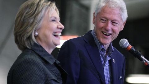 AMES, IA - NOVEMBER 15: Democratic presidential candidate Hillary Clinton (L) and her husband and former President Bill Clinton share a moment on stage during the Central Iowa Democrats fall barbecue November 15, 2015 at Hansen Agriculture Student Learning Center of Iowa State University in Ames, Iowa. Clinton continued to campaign for the nomination from the Democratic Party. (Photo by Alex Wong/Getty Images)