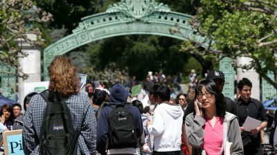 BERKELEY, CA - APRIL 17: UC Berkeley students walk through Sather Gate on the UC Berkeley campus April 17, 2007 in Berkeley, California. Robert Dynes, President of the University of California, said the University of California campuses across the state will reevaluate security and safety policies in the wake of the shooting massacre at Virginia Tech that left 33 people dead, including the gunman, 23 year-old student Cho Seung-Hui. (Photo by Justin Sullivan/Getty Images)