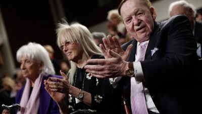 WASHINGTON, DC - MARCH 02: American businessman Sheldon Adelson (R) applauds during a roundtable discussion on Capitol Hill with his wie Miriam Adelson (C) and Marion Wiesel (L) March 2, 2015 in Washington, DC. Elie Wiesel, Sen. Ted Cruz and Rabbi Scmuley Boteach participated in a discussion entitled "The Meaning of Never Again: Guarding Against a Nuclear Iran." (Photo by Win McNamee/Getty Images)
