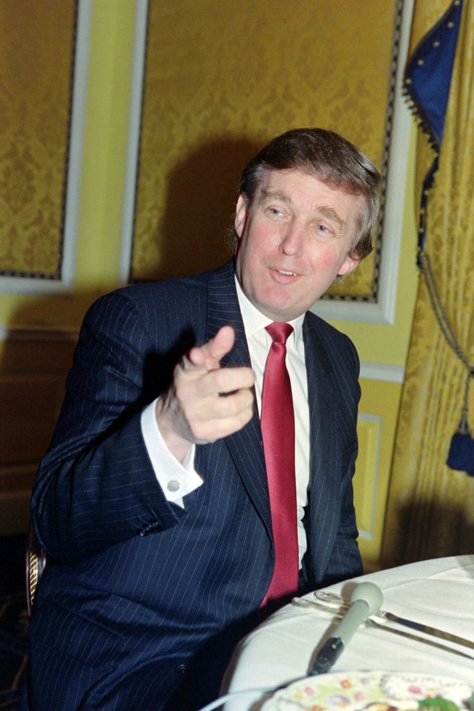 Developer Donald Trump answers questions of reporters about his divorce from wife Ivana at a news conferencein New York on Dec. 11, 1990. A Manhattan judge granted a divorce to the Trumps citing the millionaire's "cruel and inhuman treatment" of his ex-wife. (Photo by Timothy A. Clary/AFP/Getty Images)