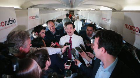 Republican presidential candidate Sen. Marco Rubio (R-FL) talks with reporters on his charter flight from Manchester-Boston Regional Airport February 10, 2016 en route to Spartanburg, South Carolina. (Photo by Chip Somodevilla/Getty Images)