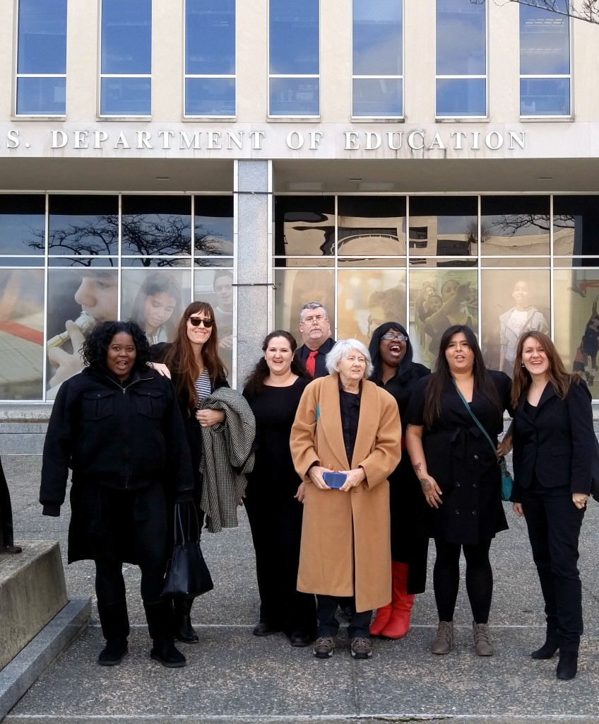 Debt strikers from left to right: Latonya Suggs, Debt Collective organizer Laura Hanna, Brittany Prock, Paul Hicks, Alicia Stevens, Pam Hunt, Makenzie Vasques and Debt Collective organizer Ann Larson.
