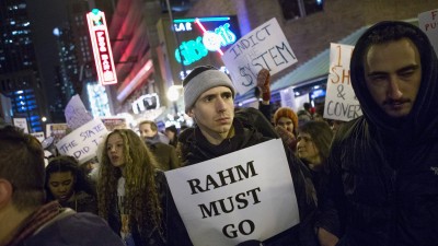 CHICAGO, IL - DECEMBER 18: Demonstrators calling for the resignation of Chicago Mayor Rahm Emanuel march through downtown on December 18, 2015 in Chicago, Illinois. A recently released video showing the shooting of teenager Laquan McDonald by Chicago Police officer Jason Van Dyke has sparked almost daily protests in the city. Demonstrators have accused Emanuel of trying to cover up the circumstances surrounding the shooting. (Photo by Scott Olson/Getty Images)