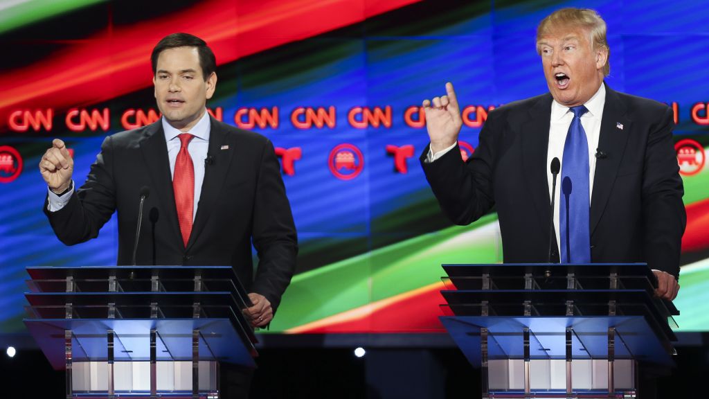 Donald Trump (R) and Sen. Marco Rubio (R-FL) talk over each other at the Republican presidential debate at the Moores School of Music at the University of Houston on Feb. 25, 2016 in Houston. The debate is the last before the March 1 Super Tuesday primaries. (Photo by Michael Ciaglo-Pool/Getty Images )