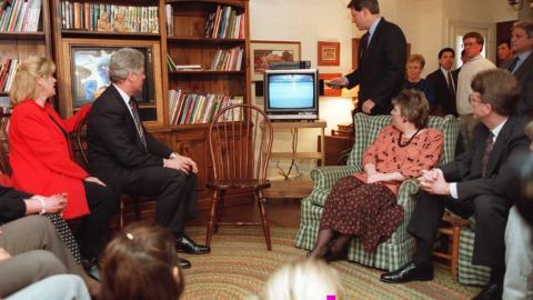 Vice President Al Gore speaks as President Bill Clinton looks on during an informal discussion with parents and children in Alexandria, Virginia on Feb. 9, 1996. Clinton had signed the Telecommunications Act the previous day. (Photo by Paul J. Richards/AFP/Getty Images)