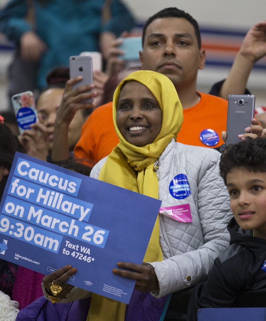 SEATTLE, WA - MARCH 22: Supporters of Democratic presidential candidate Hillary Clinton cheer during a rally at Rainier Beach High School on March 22, 2016 in Seattle, Washington. Clinton was spending the day in Washington ahead of the state's Democratic Party caucuses on March 26. (Photo by Stephen Brashear/Getty Images)