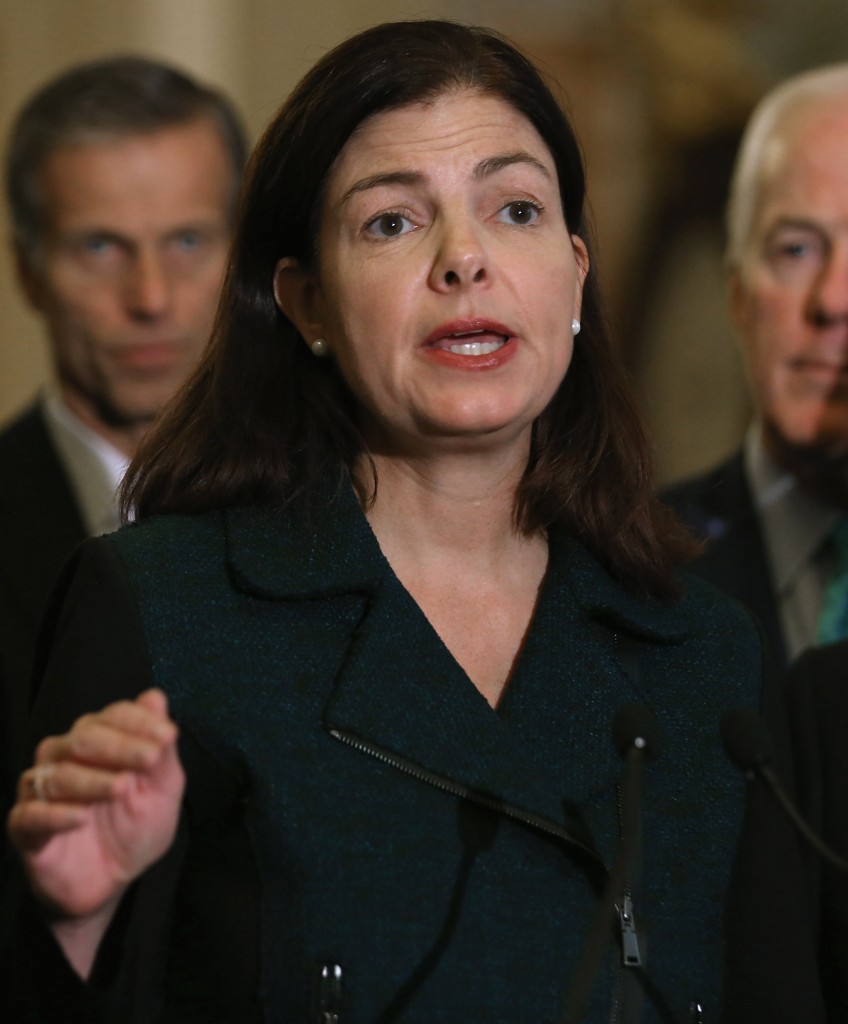 WASHINGTON, DC - NOVEMBER 10: Sen. Kelly Ayotte (R-NH) talks to reporters after the weekly Republican policy luncheon with Senate GOP leaders at the U.S. Capitol November 10, 2015 in Washington, DC. The Senate passed the Defense Authorization Act by a vote of 91-3, sending the spending bill back to President Barack Obama with language that will make it hard for him to close the military prison at Guantanamo before he leaves office in 2017. (Photo by Chip Somodevilla/Getty Images)