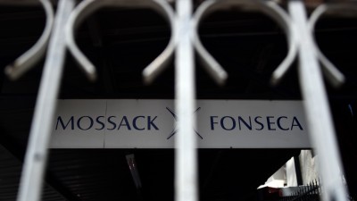 View of a sign outside the building where Panama-based Mossack Fonseca law firm offices are in Panama City, on April 4, 2016. A massive leak -coming from Mossack Fonseca- of 11.5 million tax documents on Sunday exposed the secret offshore dealings of aides to Russian president Vladimir Putin, world leaders and celebrities including Barcelona forward Lionel Messi. An investigation into the documents by more than 100 media groups, described as one of the largest such probes in history, revealed the hidden offshore dealings in the assets of around 140 political figures -- including 12 current or former heads of states. AFP PHOTO/ Rodrigo ARANGUA / AFP / RODRIGO ARANGUA (Photo credit should read RODRIGO ARANGUA/AFP/Getty Images)