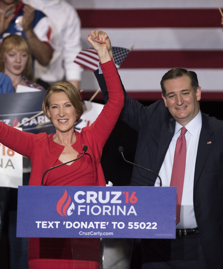 INDIANAPOLIS, IN - APRIL 27: Republican presidential candidate Sen. Ted Cruz (R-TX) holds up hands with former Hewlett-Packard chief executive Carly Fiorina, at a campaign rally in the Pavilion at the Pan Am Plaza on April 27, 2016 in Indianapolis, Indiana. Cruz named Carly Fiorina as his pick for Vice President running mate during the rally. (Photo by Ty Wright/Getty Images)