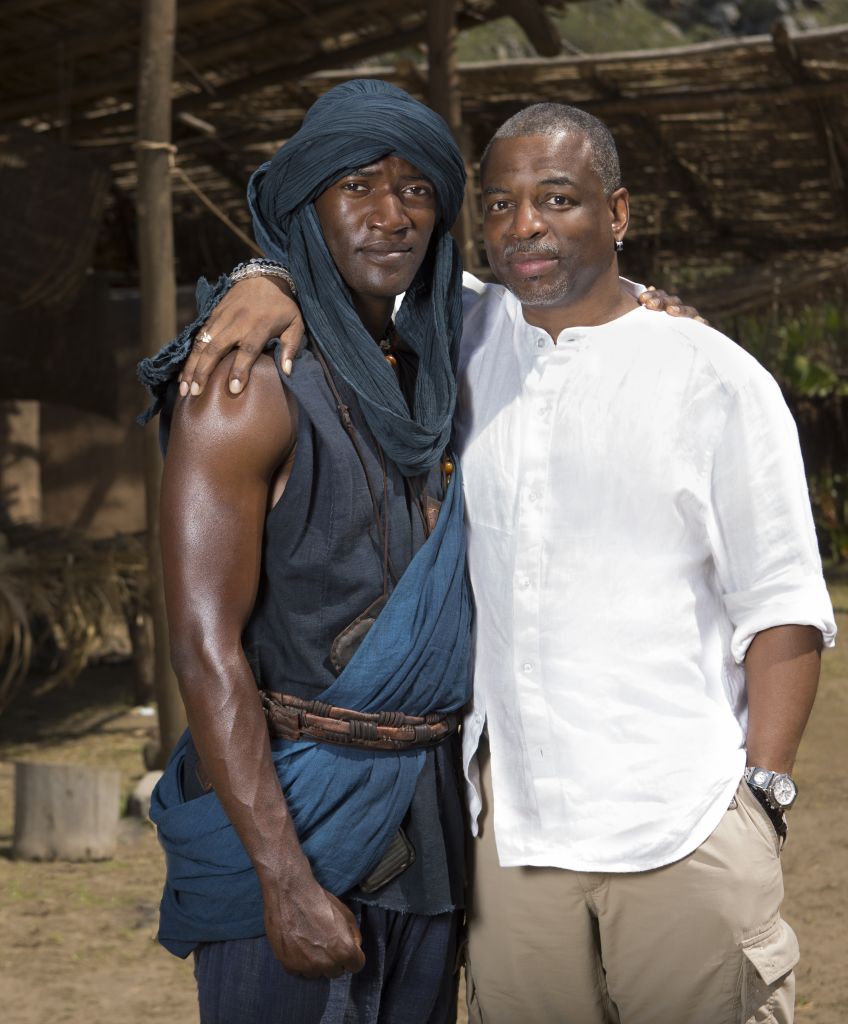Actor Malachi Kirby (left) stars as Kunta Kinte in the remake of "Roots," with LeVar Burton, who originated the role in the legendary 1977 miniseries. Burton is an executive producer of A&E and the History Channel's new production. (Photo by Casey Craffords/A&E Networks)