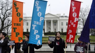 Protesters demonstrate against Trans Pacific Trade deal in front of White House.