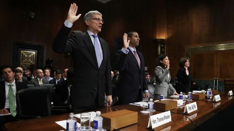 Federal Communications Commission (FCC) Chairman Thomas Wheeler and FCC Commissioner Ajit Pai are sworn in during a hearing before the Privacy, Technology and the Law Subcommittee of Senate Judiciary Committee, May 11, 2016. (Photo by Alex Wong/Getty Images)