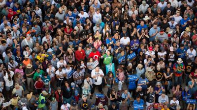 A crowd gathers to watch as Democratic presidential candidate Bernie Sanders speaks during a rally in Oakland, California on May 30, 2016. (JOSH EDELSON/AFP/Getty Images)