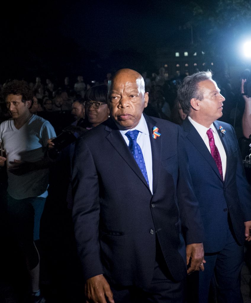 Rep. John Lewis (D-GA) makes his way back to the US Capitol after speaking to supporters of House Democrats taking part in a sit-in on the floor of the House of Representatives on June 22, 2016. (Photo by Pete Marovich/Getty Images)