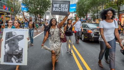 About 2,000 New Yorkers marched in Manhattan, bringing traffic to a halt for hours in a demonstration demanding police accountability and remembering Delrawn Small, Alton Sterling and Philando Castile, the three men recently shot dead by police. (Photo by Erik Mcgregor/Pacific Press/LightRocket via Getty Images)