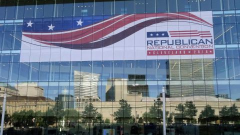The skyline of downtown Cleveland is reflected on the windows of the Convention Center, where the Republican National Convention opens Monday. (Photo by Eva Hambach/AFP/Getty Images)