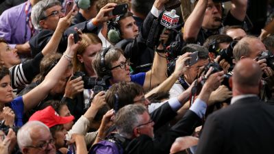 Journalists try to get images of Indoana Gov. Mike Pence on July 18, 2016, the first day of the Republican National Convention, in Cleveland. (Photo by Tasos Katopodis/WireImage)