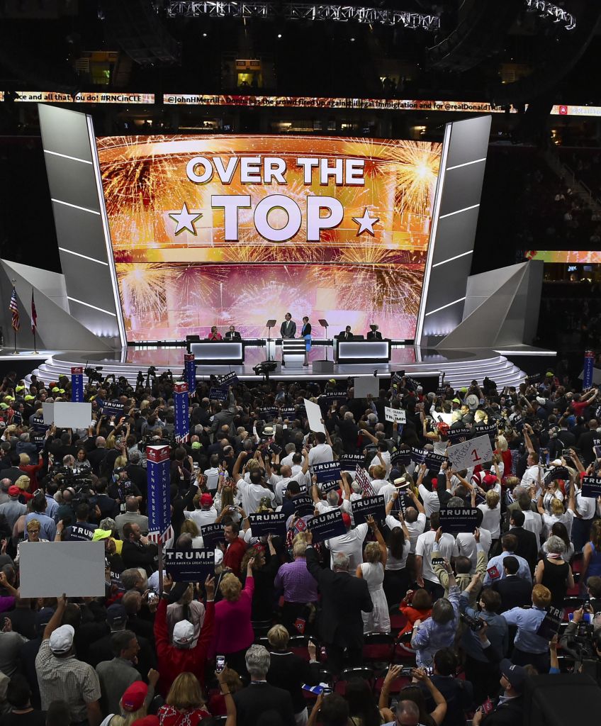Convention-goers celebrate after Republican presidential candidate Donald Trump won the nomination on the second day of the Republican National Convention on Tuesday, July 19, 2016. (Photo by Jabin Botsford/The Washington Post via Getty Images)