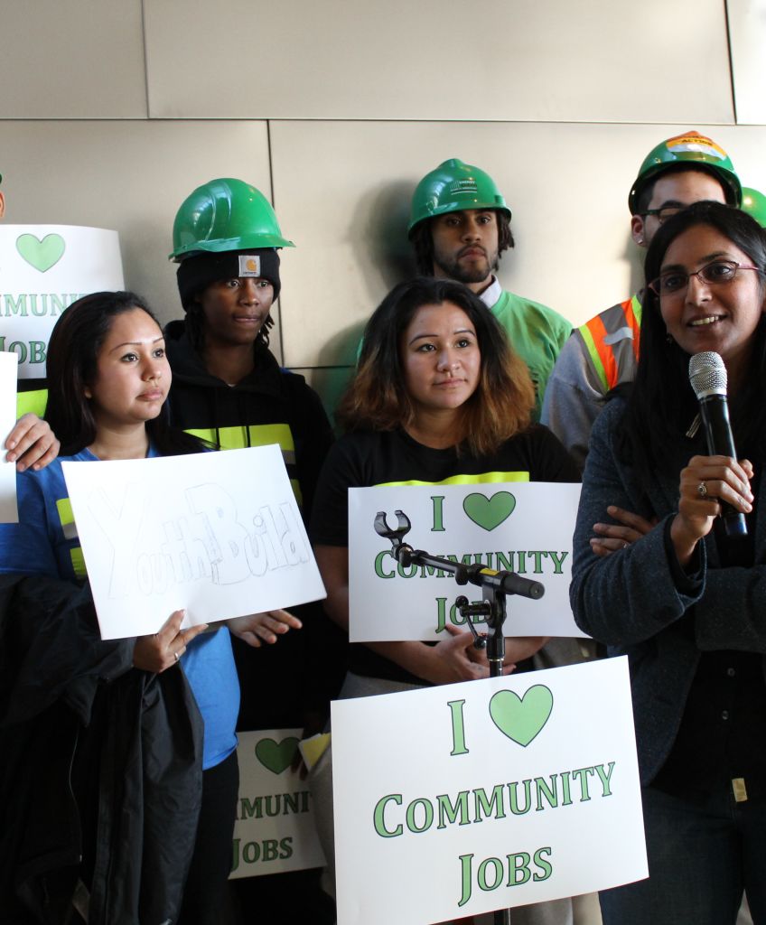 City Councilmember Kshama Sawant with workers