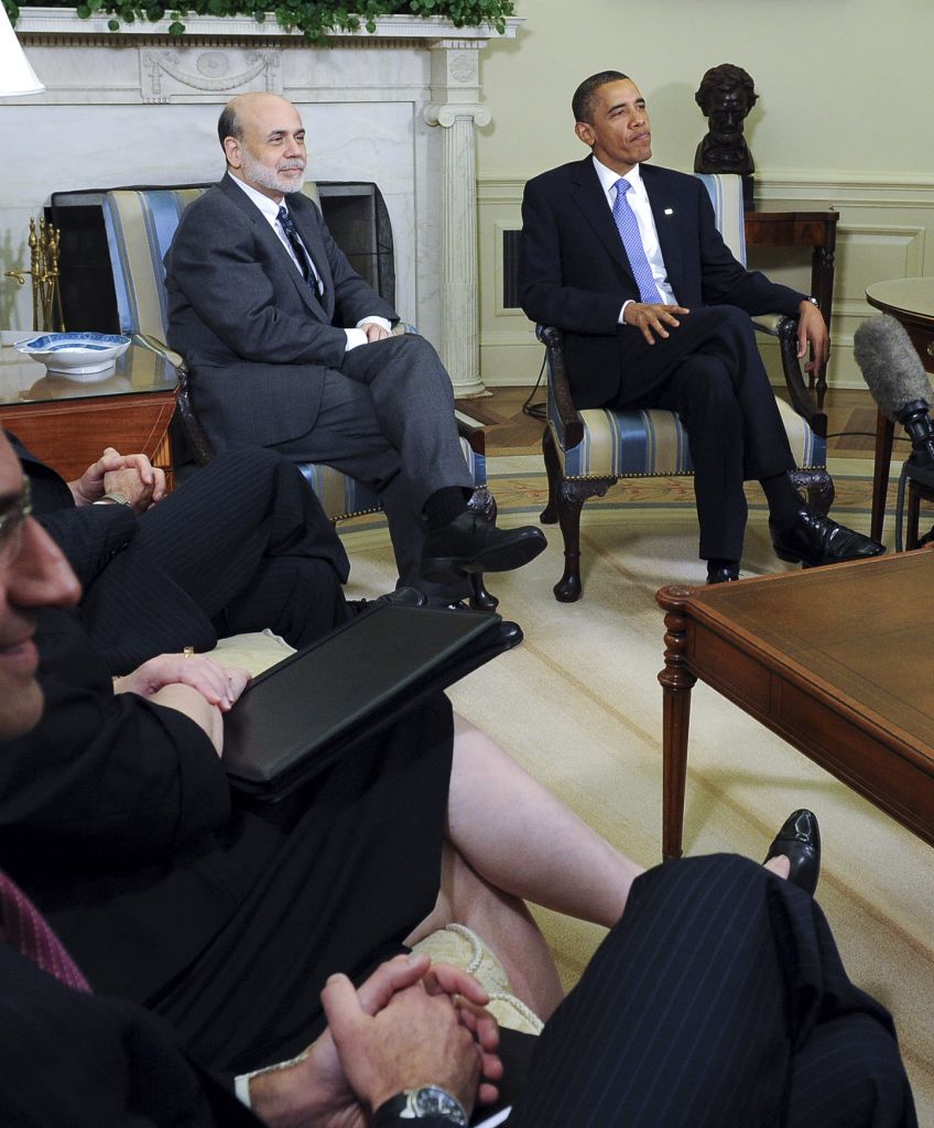 President Barack Obama, second from right, speaks to the media after meeting with his economic advisers in the Oval Office of the White House in Washington, DC, on Tuesday, June 29, 2010. Sitting from left are, Peter Orszag, the White House budget director, Ben S. Bernanke, chairman of the US Federal Reserve, Obama and Timothy Geithner, US treasury secretary. (Photographer: Roger L. Wollenberg/Pool via Bloomberg)