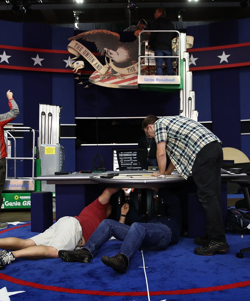 Workers assemble the set for the vice presidential debate at Longwood University in Farmville, Virginia. (Photo by Win McNamee/Getty Images)