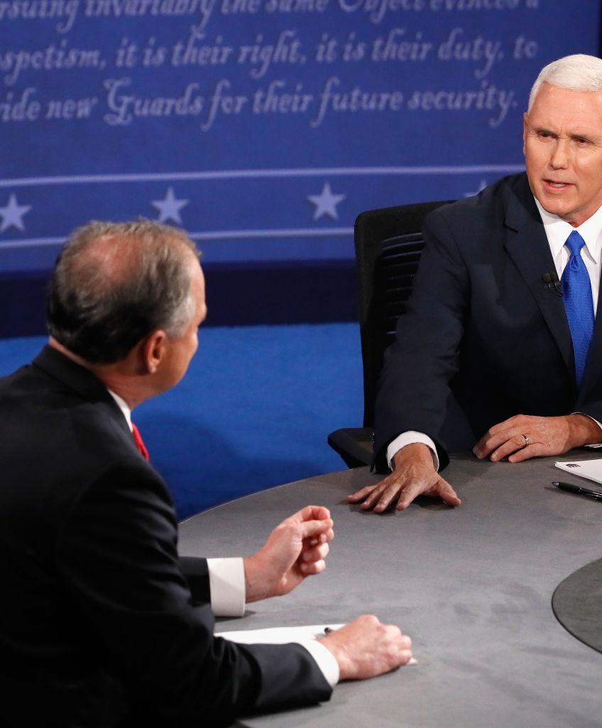 Democratic vice presidential nominee Tim Kaine (L) and Republican vice presidential nominee Mike Pence (R) debate during the Vice Presidential Debate at Longwood University on October 4, 2016 in Farmville, Virginia. (Photo by Andrew Gombert - Pool/Getty Images)