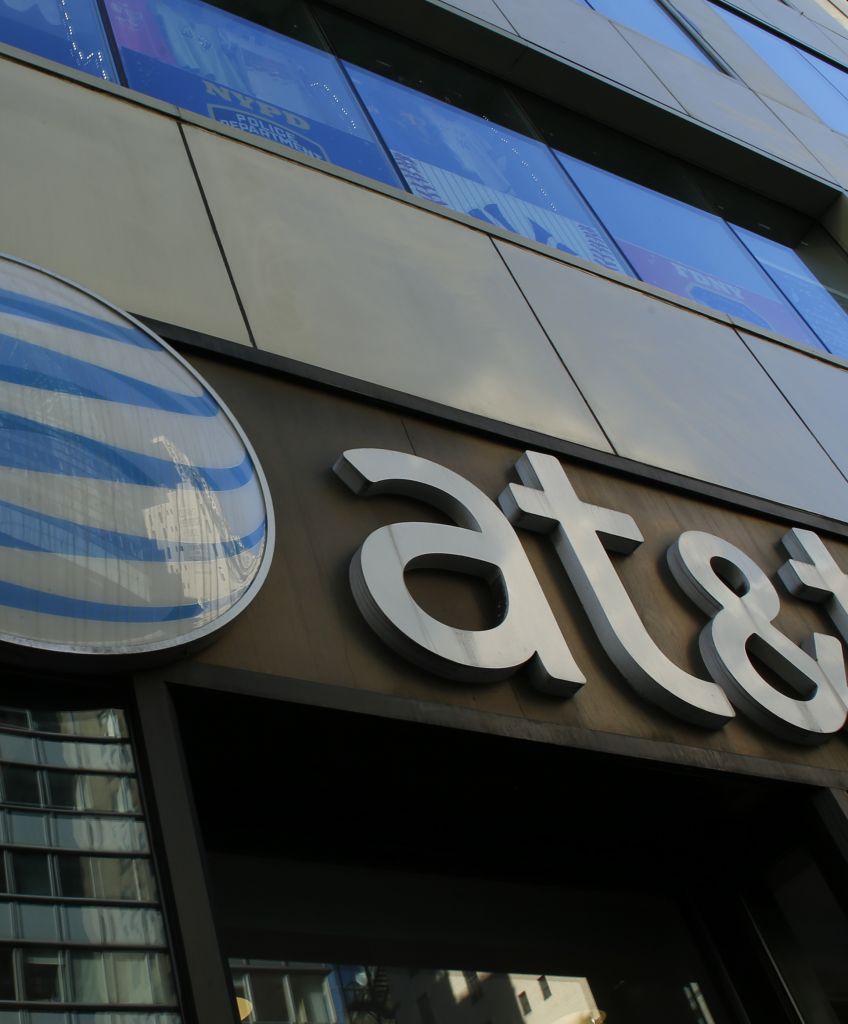 An AT&T store is seen on 5th Avenue in New York on October 23, 2016. AT&T unveiled a mega-deal for Time Warner that would transform the telecom giant into a media-entertainment powerhouse. (KENA BETANCUR/AFP/Getty Images)