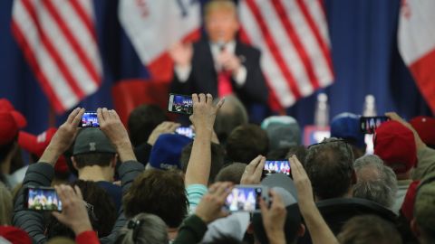 People photographing Donald Trump with their smartphones at a campaign rally in Council Bluffs, Iowa. (Photo by Christopher Furlong/Getty Images)