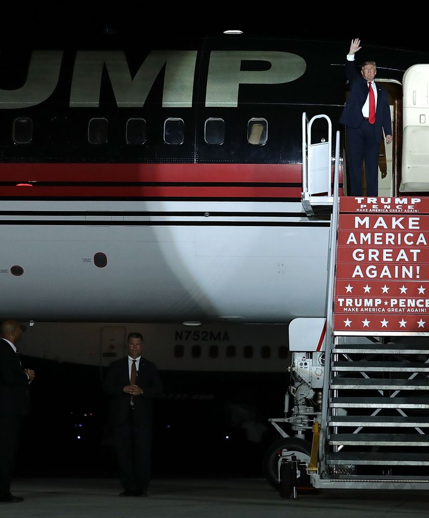 Republican presidential nominee Donald Trump steps off of his private jet as he arrives for a campaign rally in Albuquerque, New Mexico. (Photo by Chip Somodevilla/Getty Images)