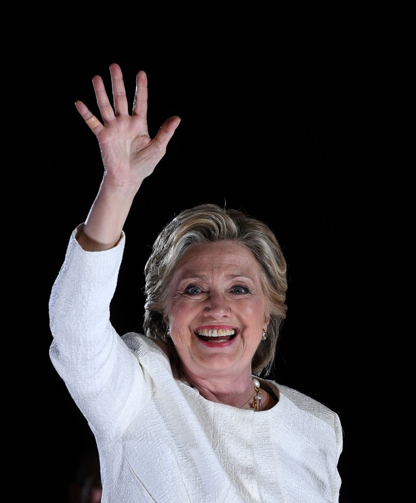 Democratic presidential nominee Hillary Clinton waves to supporters during a campaign rally in Sanford, Florida, on Nov. 1, 2016. (Photo by Jewel Samad/AFP/Getty Images)