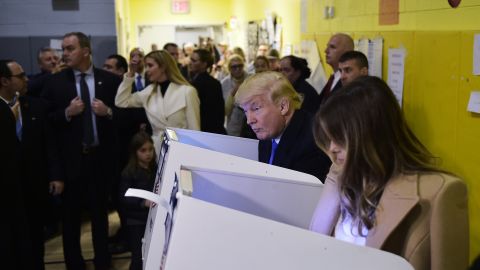 Donald Trump and his wife Melania fill out their ballots at a polling station in a school during the 2016 presidential elections on November 8, 2016 in New York. (MANDEL NGAN/AFP/Getty Images)