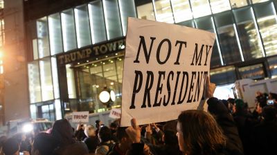 Hundreds of protestors rally against Donald Trump outside Trump Tower in New York City on Nov. 9, 2016. (Photo by Drew Angerer/Getty Images)