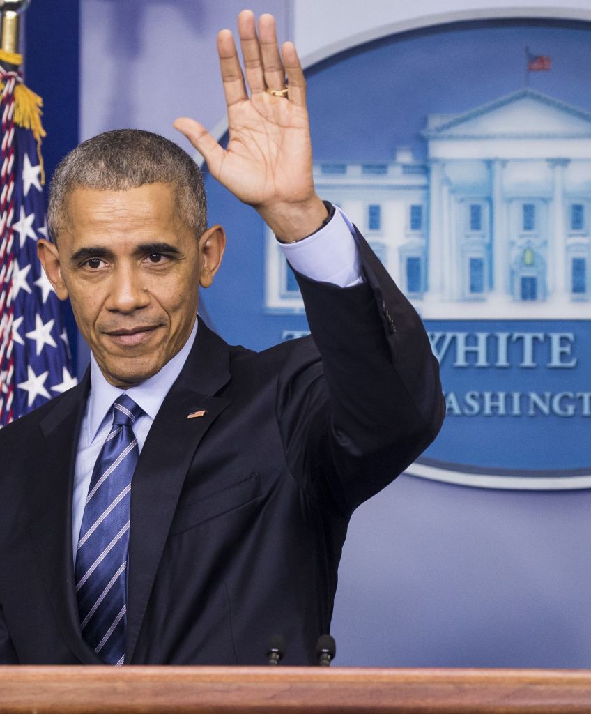 President Barack Obama waves at the conclusion of his annual end-of-year news conference at the White House in Washington, USA on December 16, 2016. (Photo by Samuel Corum/Anadolu Agency/Getty Images)