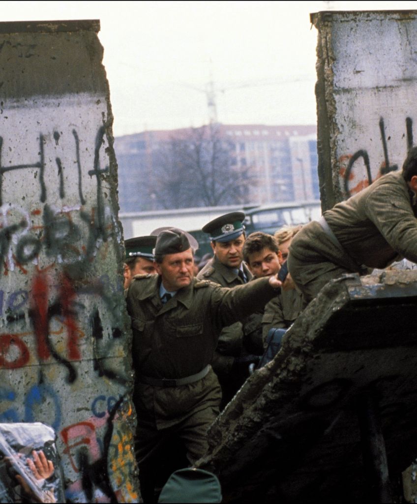 The Berlin Wall opening in Berlin, Germany in November 1989. (Photo by Patrick PIEL/Gamma-Rapho via Getty Images)