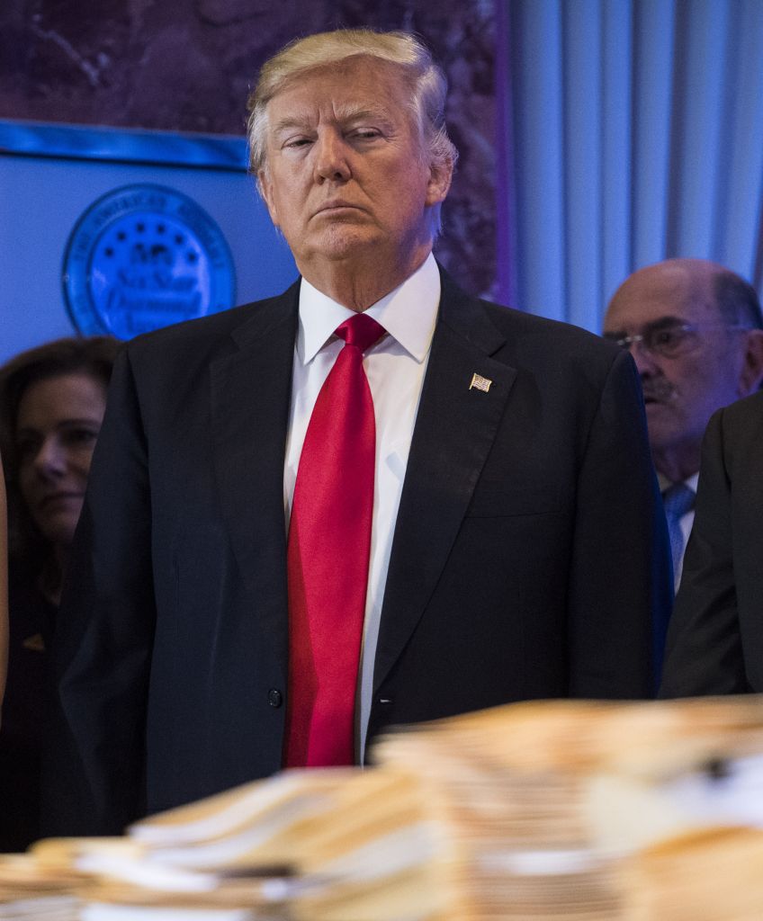 President-elect Donald Trump, Ivanka Trump and Donald Trump Jr., during a press conference at Trump Tower in New York on Wednesday, Jan. 11, 2017. Trump said the manila folders on the table contained legal documents, a prop to indicate his efforts to avoid conflicts of interest. (Photo by Jabin Botsford/The Washington Post via Getty Images)