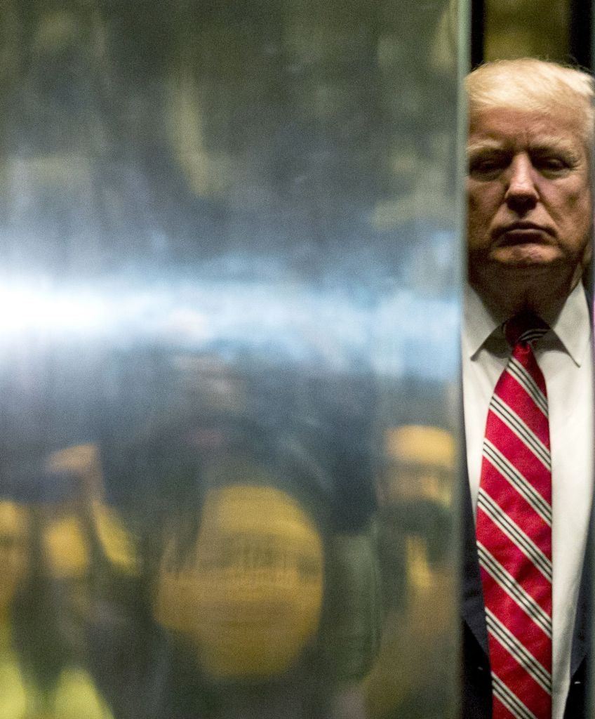 President-elect Donald Trump boards the elevator at Trump Tower in New York City on January 16, 2017.(DOMINICK REUTER/AFP/Getty Images)