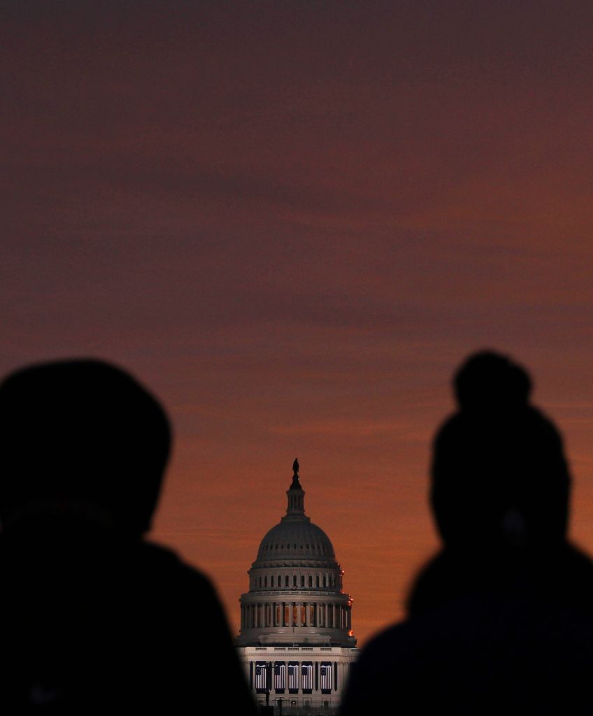 People gather on the National Mall prior to Donald Trump's Presidential Inauguration on January 20, 2017 in Washington, DC. (Photo by Patrick Smith/Getty Images)