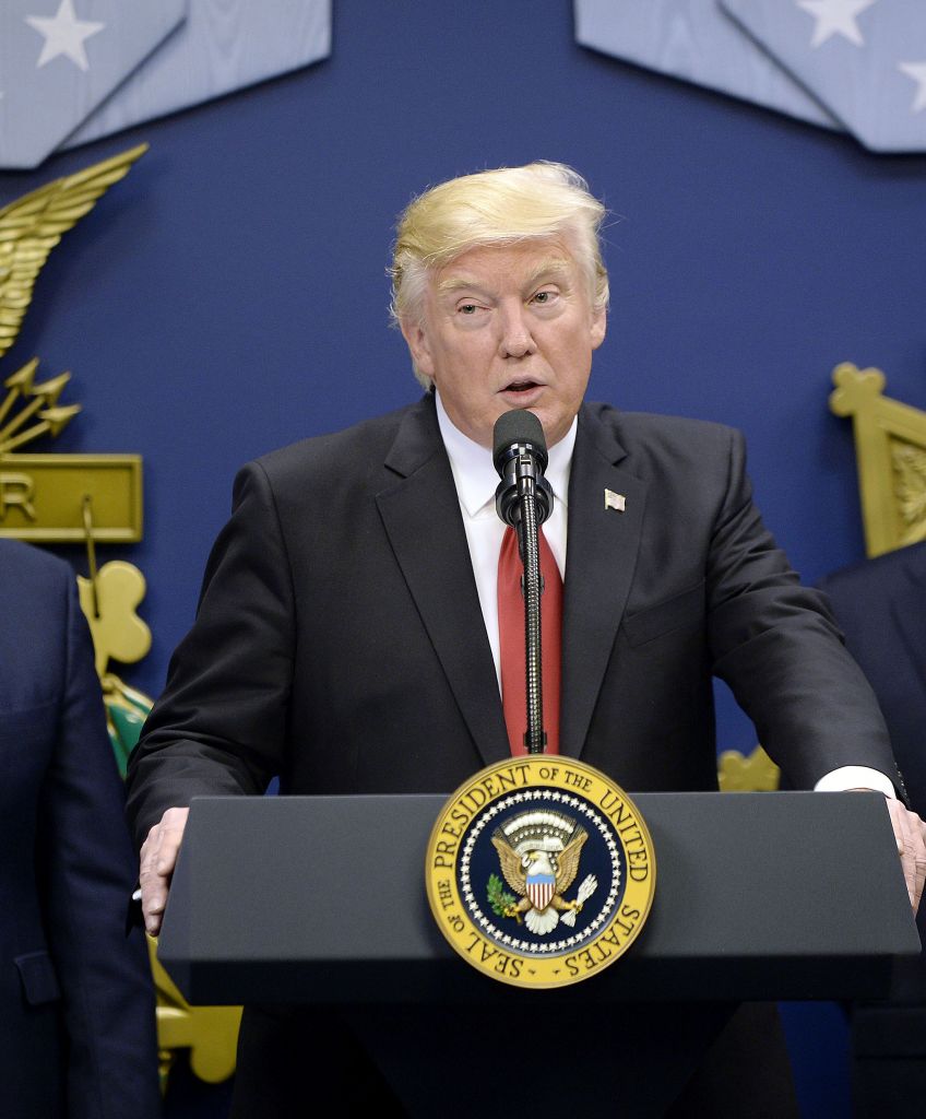 President Donald Trump joins Vice President Mike Pence (left) and Gen. James Mattis, secretary of defense, in the Hall of Heroes at the Department of Defense in Arlington, Virginia, on Jan. 27, 2017. (Photo by Olivier Douliery/Pool via Bloomberg)