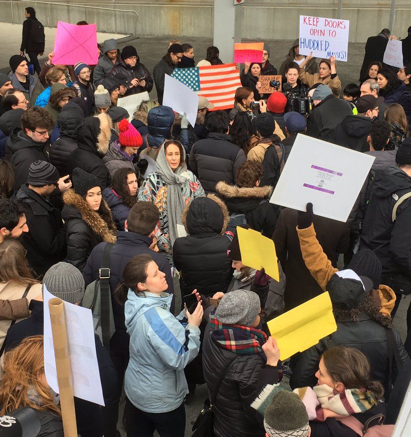 Protesters at JFK airport in New York City. (Photo by Daniel Altschuler)