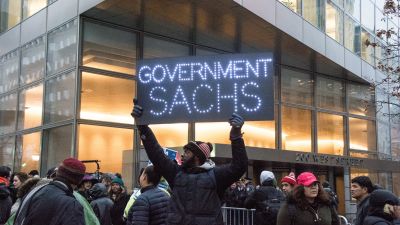 Activists protest Goldman Sachs' growing influence on Capitol Hill, specifically several Cabinet and other staff appointments made by Donald Trump, by camping at its. (Photo by M. Stan Reaves/Pacific Press/LightRocket via Getty Images)