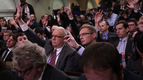 Members of the media raise their hands to ask questions during a daily White House briefing by Trump administration press secretary Sean Spicer on Jan. 23, 2017. (Photo by Alex Wong/Getty Images)