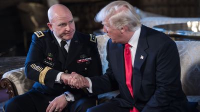 President Donald Trump shakes hands with US Army Lt. Gen. H.R. McMaster, his new national security adviser, at his Mar-a-Lago resort in Palm Beach, Florida, on Feb. 20, 2017. (Photo by Nicholas Kamm/AFP/Getty Images)