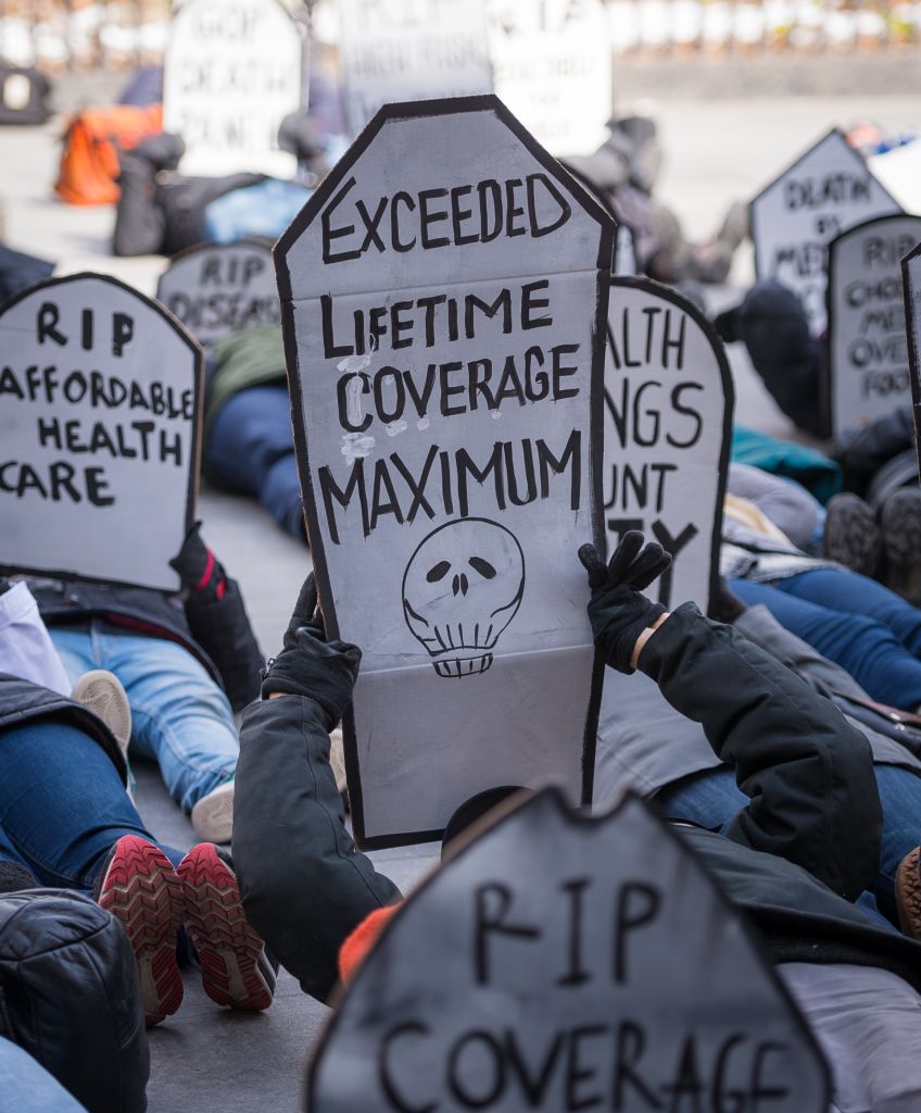 Activists gathered near Brooklyn Borough Hall, where the staged a rally and symbolic "die-in" in opposition to the repeal of the Affordable Care Act (ACA) and its replacement by Republican-authored legislation currently under proposal in the US House of Representatives. (Photo by Albin Lohr-Jones/Pacific Press/LightRocket via Getty Images)