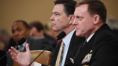 FBI Director James Comey and NSA Director Mike Rogers appear in front of the House Permanent Select Committee on Intelligence at the Longworth House Office Building on Monday, March 20, 2017 in Washington, DC. (Photo by Matt McClain/The Washington Post via Getty Images)