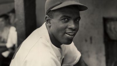 A portrait of the Brooklyn Dodgers' infielder Jackie Robinson in uniform (circa 1945). (Photo by Hulton Archive/Getty Images)