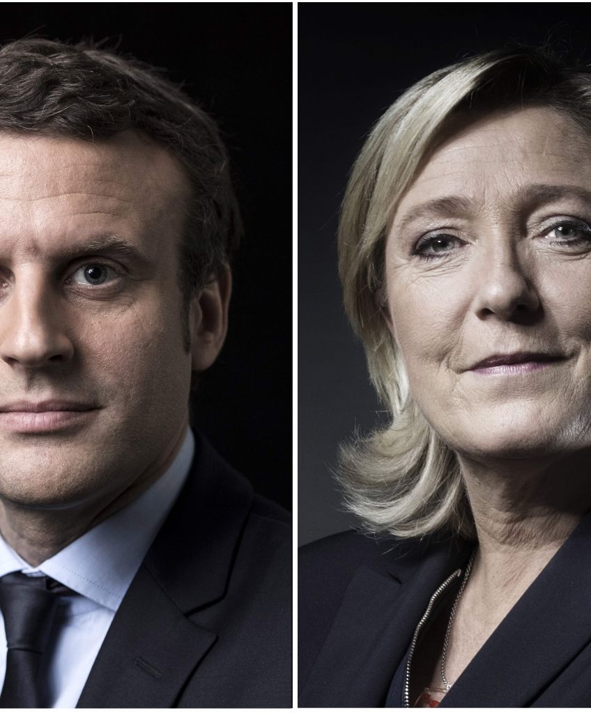 A combination of pictures made on April 23, 2017 shows French presidential election candidate for the En Marche! movement Emmanuel Macron and French presidential election candidate for the far-right Front National (FN) party Marine Le Pen posing in Paris. (Photos by Joel Saget, Eric Feferberg/AFP/Getty Images)