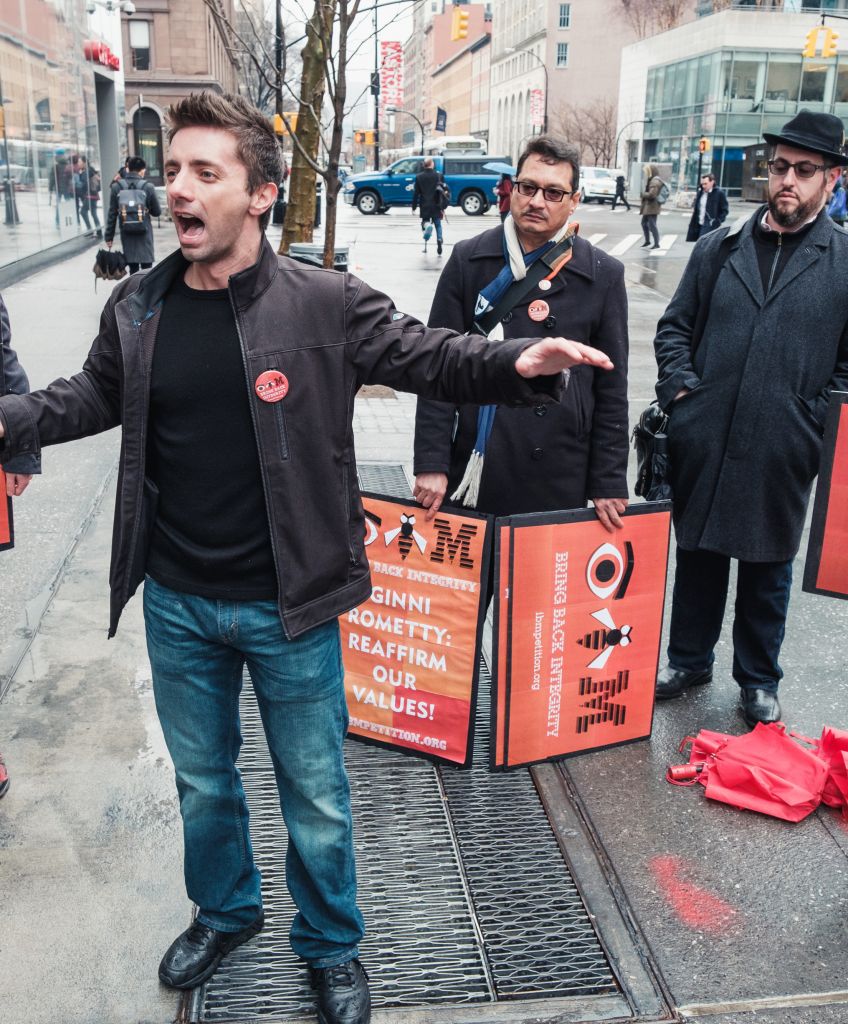 Daniel Hanley speaks while IBM colleagues look on at the New York petition delivery event in New York on March 28, 2017. (Photo courtesy of Coworker.org)