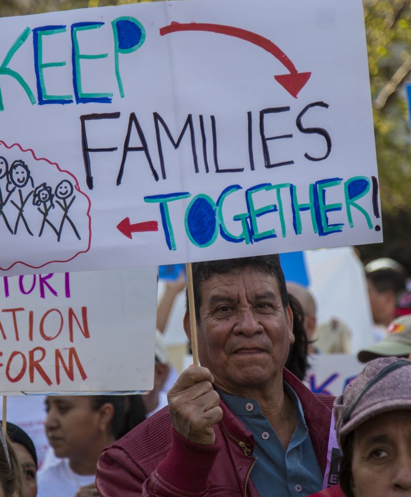Demonstrators rally in New York's Union Square Park during May Day protests in 2014. (Photo by Tony Savino/Corbis via Getty Images)