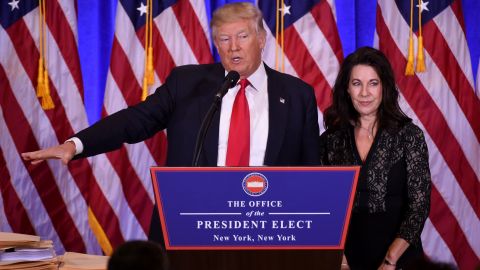 President-elect Donald Trump and his attorney Sheri Dillon at a press conference in New York on Jan. 11, 2017, where they discussed how Trump would handle his business affairs while in office. (Photo by Don Emmert/AFP/Getty Images)